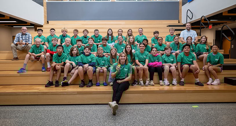 Olympic gold medalist Katie Ledecky poses with students from Unified School District 232’s Cedar Trails Exploration Center (CTEC) Center for Advanced Professional Studies (CAPS) in Lenexa, KS
