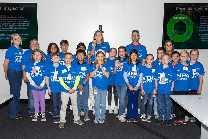 Katie Ledecky takes a group photo with students at the STEM Forward education event in Reno, NV